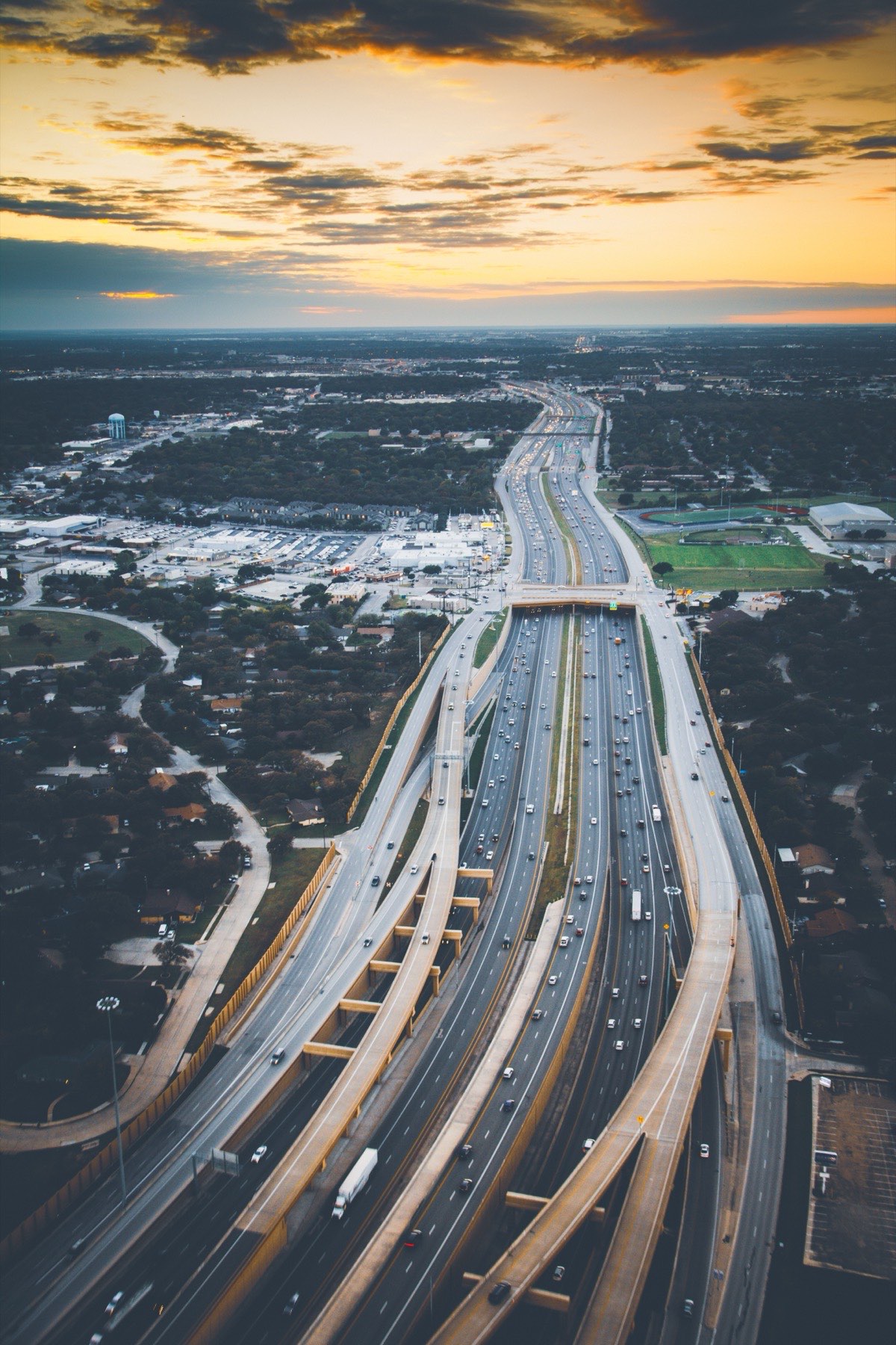 Aerial view of a highway interchange at dusk